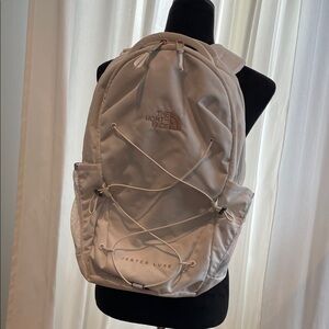The North Face Jester Luxe Backpack in Gardenia White/Burnt Coral Metallic